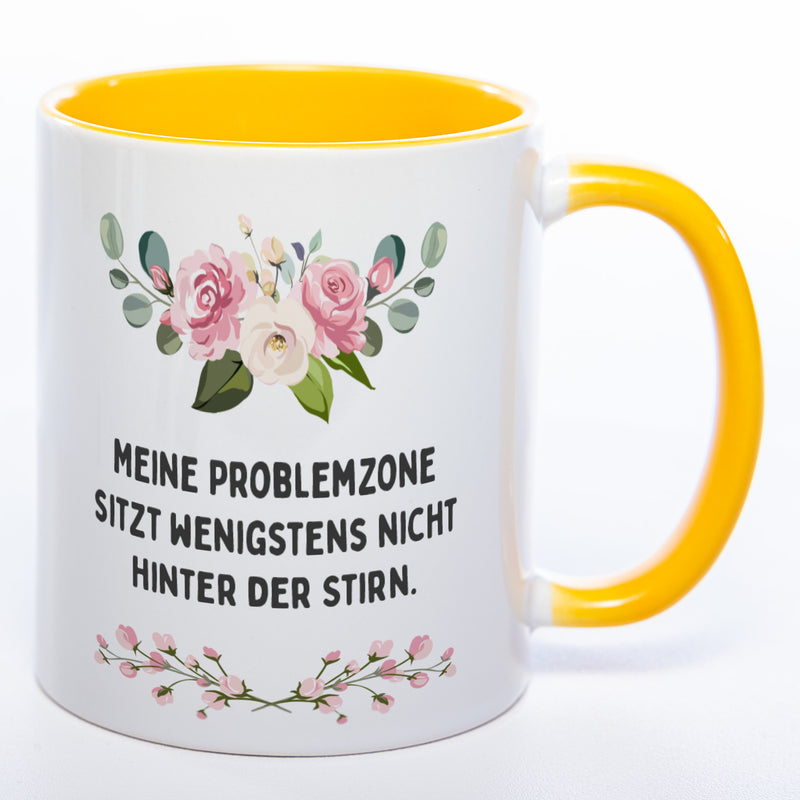 Blümchen-Tasse mit Spruch "Meine Problemzone sitzt wenigstens nicht hinter der Stirn." - Lustige Kaffeetasse spülmaschinenfest