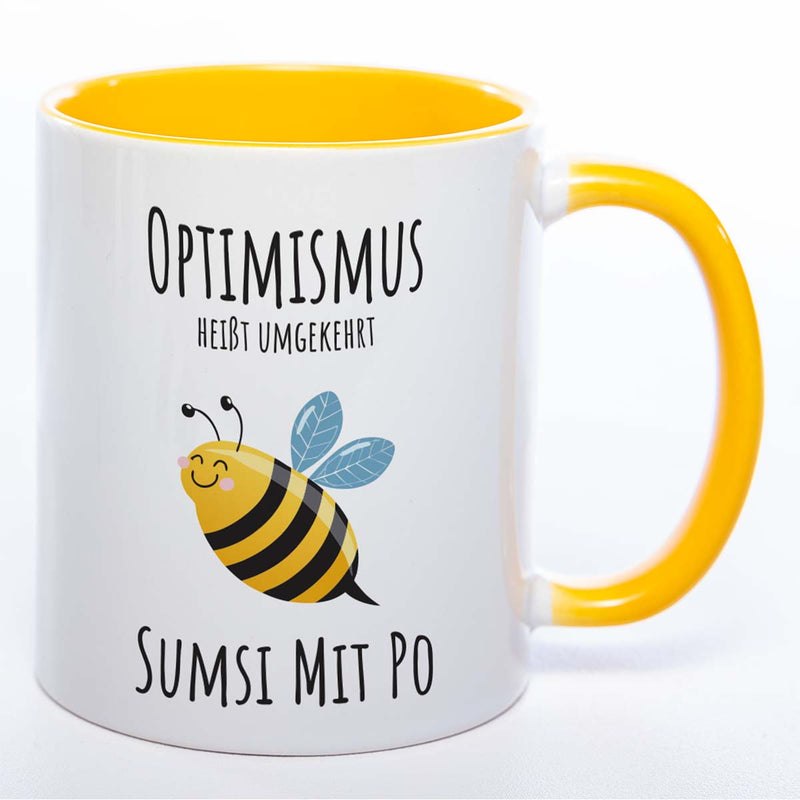 Lustige Tasse „Optimismus – Sumsi mit Po“