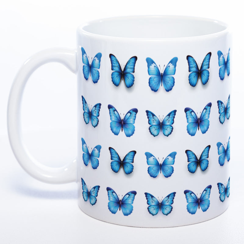 Spülmaschinenfeste Tasse mit vielen blauen Schmetterlingen - Kaffeetasse