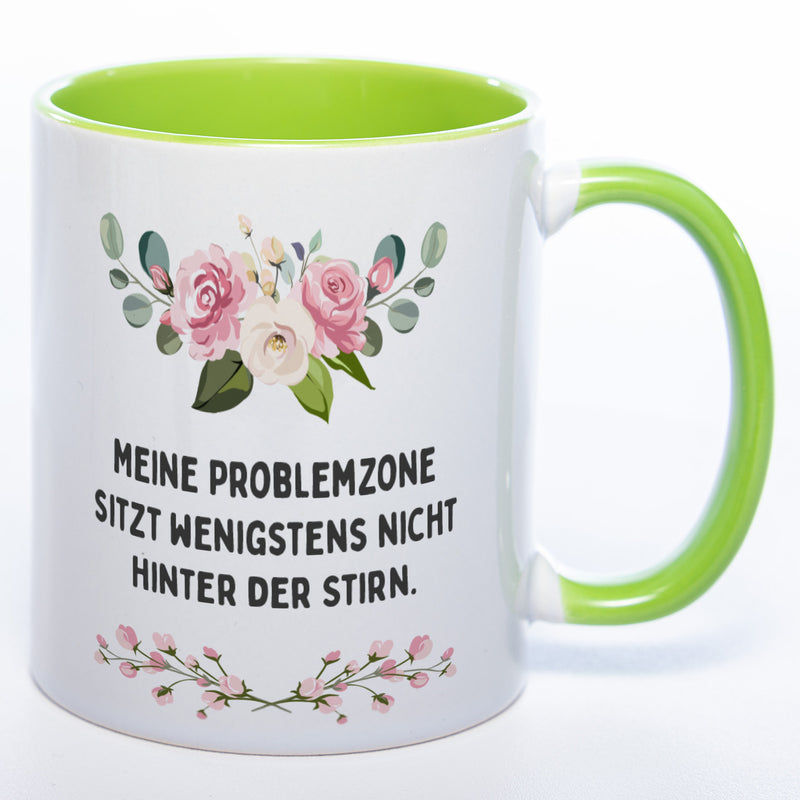 Blümchen-Tasse mit Spruch "Meine Problemzone sitzt wenigstens nicht hinter der Stirn." - Lustige Kaffeetasse spülmaschinenfest